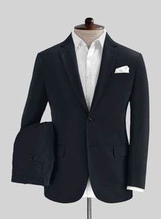 Stand out at the next special occasion be it a strictly formal one or a wedding with our Dark Blue Stretch Chino Suit. Crafted from cotton lycra blend, the suit gives a bespoke feel and tailored appearance with its hand finished details, its dark blue hue adds an extra little something to it and a structured silhouette drapes effortlessly. The suit will ensure you look sharp from the first meeting of the day through to networking events thereafter.  Look Includes   Dark Blue Stretch Chino Fabric  Two Button Jacket Style  Notch Lapel   Horn Royal Black  Buttons  Single Vent  Three Cuff Buttons  Two Welted Back Pockets on Trousers   Click 'Customize Now' to modify the look if needed.   Lining: Viscose; Dry Clean. First Meeting, Button Jacket, Stretch Chinos, Jacket Buttons, Black Button, Blue Hues, Jacket Style, A Wedding, Dark Blue