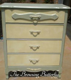 an old dresser painted white and green with the words the browsing butterfly on it