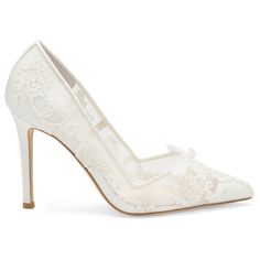 These classic flower wedding shoes are encased in elegant lacework that trails from toe to heel. The straight lines create a strong profile, balanced with the elegantly looping lace pattern. Everything is topped off with a petite bow made of ivory picot ribbon. Create a new wedding heirloom with Sophia ivory lace heels wedding wear for brides. Handmade, extra padding for all-day comfort Reviews say fit true to size Heel height: 4 in / 10.1 cm Color: Ivory Material: Lace, silk, and mesh upper; le