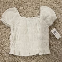 Old Navy White Elastic Toddler Top With Puff Sleeve Size 18m White Puff Sleeve Top For Summer, Cute Solid Color Tops With Puff Sleeves, Cute Solid Puff Sleeve Tops, Cute Solid Color Puff Sleeve Tops, Casual Fitted Tops For Playtime, Casual Spring Blouse For Playtime, White Spring Blouse For Playtime, Navy Striped Shirt, Navy Shirt Dress