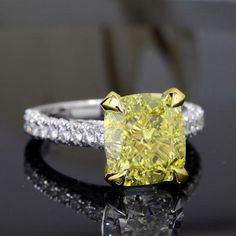 3.40 Ct. Canary Fancy Light Yellow Cushion Cut 3 Row Pave Diamond Ring VS1 Clarity GIA Certified Luxury Yellow Diamond Ring With Pave Setting, Luxury Yellow Diamond Ring, Yellow Diamond Ring For Anniversary, Yellow Brilliant Cut Diamond Ring, Yellow Diamond Rings With Diamond Accents, Yellow Rings With Diamond Accents In Fine Jewelry Style, Yellow Rings With Diamond Accents, Yellow Diamond Ring With Cushion Cut, Yellow Cushion Cut Diamond Ring With Center Stone