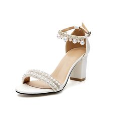 PRICES MAY VARY. QUALITY MATERIAL - Upper Materials: Leatherette; Lining Materials: Leather; Outsole Materials: Rubber. Soft and comfortable on the skin, Heel measures approx 2.76 inches. FEATURE: Comfortable mid heel, simple and elegant design, match for any wedding dress and ivory skirt, Classic Open-toe, Unique appliques Pearl Chain wedding bridal shoes for brides,bridesmaid, Single band With Adjustable buckle. ADJUSTABLE - Block heel pumps featuring ankle strap type and quality chunky block Bridal Shoes Chunky Heel, Strap Wedding Dress, Best Bridal Shoes, Ivory Skirt, Wedding Dresses With Straps, Wedding Sandals, Chunky Block Heels, Elegant Shoes, Bride Shoes