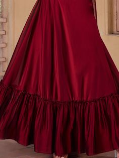 Elegance meets tradition in this stunning maroon georgette lehenga choli ensemble. Crafted with meticulous attention to detail, the lehenga features a rich maroon hue that exudes sophistication and grace. Its plain design allows for versatility, making it perfect for a variety of occasions, from weddings to festive celebrations. The georgette fabric adds a touch of luxury, draping beautifully and enhancing the overall allure of the attire.
Complementing the lehenga is a matching choli adorned wi Elegant Wedding Choli With Tiered Skirt, Wedding Georgette Skirt With Traditional Drape, Elegant Festive Georgette Skirt, Elegant Festive Choli With Tiered Skirt, Elegant Tiered Sharara For Wedding, Elegant Tiered Skirt Sharara For Wedding, Elegant Party Sharara With Tiered Skirt, Elegant Fitted Sharara With Tiered Skirt, Elegant Tiered Sharara For Party