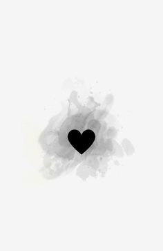 a black heart on a white background with watercolor splashes and blotches