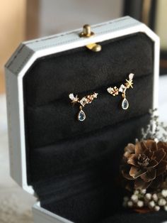 Holiday Notice: We will be on holiday from Feb 6 to Feb 15 for the Spring Festival. Orders will be shipped after we resume work. Opal Cluster Bridesmaid Earrings, Multi Stone Cluster Earrings, Tiny Drop Wedding Earrings, Blue Teardrop Stud Earrings, Bridesmaid Gifts Features * Made to Order. * Material: 925 Silver with Gold Plated * Gold Color: Yellow Gold * Stone Type: Cubic Zirconia & Lab Created Opal * Measurement: 16*8 mm * Ready to Ship in 7-10 Business Days Want to find out more? Check Dainty Blue Earrings For Wedding, Sapphire Side Stones, Wedding Earrings Drop, Earrings Bridesmaid, Etsy Bridesmaid Gifts, Emerald Color, Yellow Gold Earring, Earrings Blue, Cluster Earrings