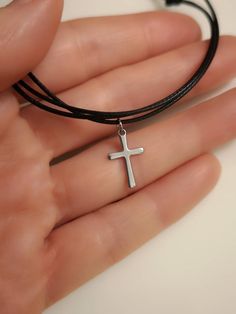 Materials: - stainless steel cross charm approx 15.5mm x 9.5 mm - braided polyester cord 1mm round Please 💗 my shop to be updated on new creations : AnaDream  - https://www.etsy.com/ca/shop/AnaDream IMPORTANT - PLEASE READ ✤ Necklace sizing (Exception: adjustable cord necklaces) ✤ It is very important to select the correct length when you place the order. Please make sure to measure your neck (or an older necklace you own) before purchasing and select the proper option. The seller will not be h Black Nylon Cord Jewelry For Gift, Black Nylon Cord Jewelry As Gift, Silver Adjustable Choker With Cord, Silver Adjustable Choker, Minimalist Black Cross Jewelry, Stainless Steel Adjustable Choker, Minimalist Choker Necklace With Adjustable Cord, Minimalist Adjustable Cord Choker Necklace, Minimalist Adjustable Cord Choker