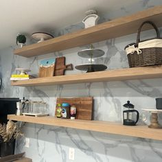 some shelves with various items on them in a room