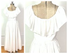 DETAILS. ethereal | ruffle | flowy darling 1970's dress. vintage white dress. ruffle neckline. fully lined. back zip. full skirt. super soft and lightweight!  great vintage condition. this dress is from my private collection. MEASUREMENTS. BUST: 36-39" WAIST: 28-30" HIPS: free LENGTH: 45" FABRIC: cotton blend LABEL: Lanz Originals https://www.etsy.com/shop/EvesAppleVintage << you can find most of my private collection -- sourced throughout the world -- here soon. call it a comeback! since closin Feminine A-line Vintage Dress With Ruffles, Fitted A-line Vintage Dress With Ruffles, Feminine Billowy Ruffled Maxi Dress, Billowy Feminine Maxi Dress With Ruffles, Feminine Billowy Maxi Dress With Ruffles, Flowy Ruffle Dress For Summer Wedding, Billowy Ruffled Maxi Dress For Spring, White A-line Vintage Dress With Ruffles, White Fitted Ruffled Vintage Dress