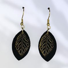 Elevate your style with our exquisite handmade leather earrings. Crafted from high-quality, genuine leather, these earrings boast a perfect blend of elegance and durability. Each pair is meticulously designed to ensure unique, artisanal charm. Featuring either hypoallergenic stainless steel or gold plated stainless steel earring wires, they offer not only a stylish look but also comfort and safety for sensitive ears. Lightweight and comfortable for all-day wear, these earrings make a bold yet so Elegant Black Leather Earrings, Black Leather Earrings As A Gift, Handmade Black Leather Earrings, Black Leather Drop Earrings, Black Leather Everyday Jewelry, Handmade Black Faux Leather Jewelry, Handmade Black Leather Jewelry, Adjustable Black Faux Leather Earrings, Earring Wires