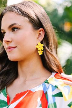 These vibrant flower earrings are so cute! We love the pop of color for spring! These beauties are going to look so good with light little sundresses this season! Chic Summer Jewelry With Flower Charm, Trendy 3d Flower Earrings For Spring, Flower-shaped Earrings For Spring Party, Flower-shaped Earrings For Summer Parties, Spring Jewelry With 3d Flowers, Spring Party Earrings With 3d Flowers, Spring Party Flower Earrings With 3d Flowers, Flower Shaped Summer Party Earrings, Spring Party 3d Flower Earrings