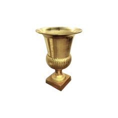 a gold vase sitting on top of a wooden stand