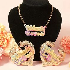 Discover the elegance of our super beautiful pastel rainbow colored 14k Vermeil Gold Plated Medical Grade stainless steel cursive name plate 3 piece jewelry set, featuring a stunning cursive name pendant necklace and matching cursive Name bamboo earrings. Each piece boasts a mesmerizing iridescent finish, perfect for adding a touch of custom glam to any outfit. Ideal for luxury gifting or treating yourself, this set combines style and personalization effortlessly. This Luxury custom set is made with 100% Real 14k gold & Medical grade stainless steel which guarantees your items will never lose its beautiful shine or Luster, it won’t turn colors over time or when wearing, these items are 100% waterproof, hypoallergenic and excellent for even the most sensitive skin types. *Yes, if you forget Custom Nameplate Jewelry As Gift For Her, Multicolor Jewelry For Mother's Day Personalized Gift, Multicolor Personalized Jewelry For Valentine's Day, Customizable Pink Nameplate Jewelry, Customizable Multicolor Jewelry For Valentine's Day, Personalized Multicolor Jewelry, Personalized Rainbow Heart Jewelry, Personalized Heart-shaped Rainbow Jewelry, Elegant Multicolor Jewelry For Mother's Day