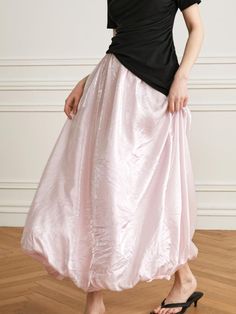 This is yyiam’s satin maxi skirt exudes a feminine mood. The satin fabric's subtle sheen adds a touch of luxury to the look. The elastic band at the hem creates a lovely silhouette.- Ideal for daily wear- Can be styled with various tops to create different looks- Its lovely design makes it easy to match with any outfit, adding a stylish touch- It has a side zipper for easy wearing and removal Pink Silk Full Skirt, Satin Floor-length Skirt For Spring, Pink Satin Evening Bottoms, Spring Floor-length Satin Skirt, Floor-length Satin Skirt For Spring, Spring Pink Silk Maxi Skirt, Pink Silk Maxi Skirt For Spring, Pink Satin Lined Skirt Bottoms, Pink Voluminous Maxi Skirt Feminine Style