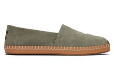 A dressed-up spin on our classic slip-on Alpargata. Designed in a dreamy palette of suedes with artisanal stitch detailing on a luxe leather wrap for an elevated touch. Perfect for the office, evenings out, and even more formal occasions. | Suede uppers. TOMS leather products support responsible manufacturing via the Leather Working Group. Removable OrthoLite® Eco LT-Hybrid™ insole for enhanced comfort and breathability made with 26% eco content including 15% hybrid materials, 6% bio-oil and 5% Spring Suede Slip-ons With Leather Footbed, Spring Slip-ons With Suede Lining, Dreamy Palette, Toms Espadrilles, Bio Oil, Platform Espadrilles, Grey Suede, Leather Products, Recycled Rubber