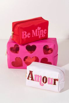 Carry all your odds and ends in style with Shiraleah's Cara "Be Mine" Zip Pouch. Made of durable polyester in a bright red color, this rectangular case is the perfect size to carry your makeup or toiletries on the go. The trendy pink sequin embroidery spells the words "Be Mine", adding a little love wherever you take it. Pair with other items from Shiraleah to complete your look! Features a top zip closure and embroidered lettering Shiraleah is a trend-driven lifestyle brand focused on the littl Red Rectangular Cosmetic Bag Gift, Rectangular Red Cosmetic Bag Gift, Rectangular Red Cosmetic Bag As Gift, Red Rectangular Cosmetic Bag With Zipper, Red Rectangular Cosmetic Bag With Zipper Closure, Red Pencil Case Pouch Gift, Rectangular Red Cosmetic Bag With Zipper, Rectangular Red Cosmetic Bag With Zipper Closure, Portable Red Rectangular Pouch