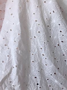 "Cotton eyelet fabric, off white color, boho bridal gown, doll dress, girl dress ❤ Listing is for One yard. If you purchase more, you will get a uncut piece . ❤ Measuring is about 51.2\" (130cm) wide ❤ It can be used for wedding dress, lingerie, bra, dresses, dolls, bridal veil, altered art, couture, costume, jewelry design, pillowcase, home decor and much more! ❤ More fabrics: https://www.etsy.com/shop/prettylaceshop?section_id=14206597 For more quantity, please feel free to convo me for custom Embroidery Couture, Eyelet Lace Fabric, Flower Lace Fabric, Design Kurti, Boho Bridal Jewelry, Crochet Lace Collar, Bodice Applique, Beautiful Crafts, Boho Bridal Gowns