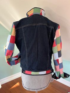 This upscaled Ralph Lauren Jean jacket is great for the perfect preppy! With the soft madras sleeves in soft colors, also added to the back of the collar and waistband. It has two outer pockets and two inner . The jacket is labeled M Measurements are Arms 25" Shoulder to shoulder 25" Shoulder to waist 22" Underarm to underarm 22 Waist around 40" If you have any questions, please don't hesitate to ask Ralph Lauren Jeans, Upcycle Clothes, Soft Colors, Jean Jacket, Jackets & Coats, Jackets For Women, Ralph Lauren, Collar, Clothes