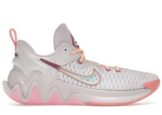 the nike zoom basketball shoe is shown in white, pink and grey with orange accents