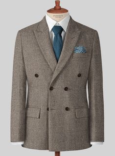 Sophisticated attire that doesn't sacrifice practicality in favor of elegance. Crafted from wool, our brown tweed suit is ideal for any occasion. Pair back your look with a white shirt and brown shoes to liven it up.   
 
 Look Includes  Dapper Brown Tweed Fabric  Double Breasted Jacket Style  Peak Lapel  Horn Brown Buttons  Single Vent  Three Cuff Buttons  Two welted back pockets on trousers   You can change the look during customization if required. 
  Lining: Viscose; Dry Clean. Brown Tweed Suit, Master Tailor, Tweed Suit, Brown Tweed, Tweed Suits, Brown Shoes, Peak Lapel, Tweed Fabric, Double Breasted Jacket