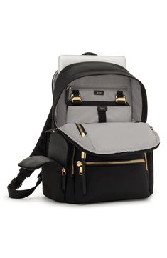 This travel-ready backpack features a handy Add-A-Bag sleeve for sliding onto suitcases along with a durable nylon design and well-organized interior. Top carry handle; adjustable backpack straps Two-way top-zip closure Exterior front zip pockets; side zip pocket; back smartphone pocket; back luggage sleeve Interior zip pockets; padded laptop pocket Nylon/leather Imported This bag includes Tumi Tracer®, an exclusive, complimentary program that helps reunite lost or stolen bags with their rightfu Macbook Screen, Tumi Backpack, Tumi Bags, Luxury Backpack, Women Backpack Travel, Bag Women Fashion, Stylish Backpacks, Stylish Handbags, Bag Trends