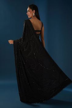 Black pre-draped saree with sequins, cutdana embroidered panels. Paired with a padded blouse with abstract cutdana, sequin, beads embroidery. - Aza Fashions Black Pre-draped Saree With Sequins, Black Silk Pre-draped Saree For Party, Glamorous Silk Pre-draped Saree With Mirror Work, Pre-draped Georgette Saree For Party, Silk Pre-draped Saree With Sequins For Party, Glamorous Draped Georgette Saree, Silk Pre-draped Party Saree With Sequins, Evening Pre-draped Saree With Mirror Work, Evening Party Wear Pre-draped Saree With Mirror Work