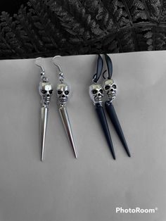 "Spooky Earrings, Horror Earrings, Skeleton Earrings, Scary Earrings, Trending Earrings, Halloween Gift, Dangle Earrings, Skeleton Gifts, Halloween Earrings, Novelty Earrings, Skeleton Jewelry, Gift For Women, Silver Earrings Available in a different colour and size, just contact me If you have any questions regarding this item, please hit the \"Ask a Question\" button next to the price and I will get back to you within 24 hours All products are 100% hand made, made with love especially for you" Silver Skull Earrings For Halloween, Skull-shaped Metal Earrings, Gothic Skull Metal Earrings, Nickel-free Skull Jewelry For Party, Edgy Halloween Jewelry, Edgy Nickel-free Earrings For Gift, Edgy Single Earring For Parties, Edgy Skull Earrings For Parties, Punk Style Plug Drop Earrings Gift