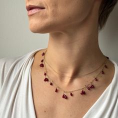 A fountain of wine-red ruby drops flows across Heather Guidero's delicate circle design in this sweet stunner. 18k yellow gold Ruby drops range in size from 3mm x 6mm (1/8" x 1/4") to 4mm x 9mm (3/16" x 3/8")Necklace is 16" long Fine Jewelry Ruby Drop Necklaces, Fine Jewelry Ruby Drop Necklace, Yellow Gold Ruby Teardrop Necklace, Yellow Gold Teardrop Ruby Necklace, Teardrop Ruby Jewelry In Yellow Gold, Teardrop Ruby Necklace In Yellow Gold, Gold Ruby Drop Jewelry, Newport Ri, Dope Jewelry