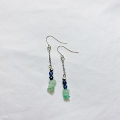 Genuine Kyanite Faceted Beads Paired With Green Aventurine Gemstone Chip Beads. Each Stainless Steel Earring Is Topped With A Faceted Silver Glass Bead. Stainless Steel Ear Wire Is Tarnish Resistant And Hypoallergenic. "Smell The Sea And Feel The Sky, Let Your Soul And Spirit Fly". -Van Morrison This Salty Sea Set Of Earrings Will Have You Dreaming Of The Ocean Blue. Deep, Mystic Blue Kyanite And Sea Green Aventurine Is A Beautiful Representation Of The Waves Crashing In. Jade Beaded Dangle Earrings For Gift, Aventurine Natural Stone Dangle Jewelry, Aventurine Natural Stone Earrings Gift, Aventurine Natural Stone Earrings, Adjustable Aventurine Dangle Jewelry, Aventurine Dangle Earrings For Gift, Everyday Blue Jewelry With Dangling Beads, Everyday Aventurine Jewelry With Natural Stones, Soul And Spirit