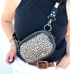 Our all leather Bum Bag is perfect for putting a little zest into your style routine! Keep your valuables safe and secure without sacrificing your fashion sense. Zip it up, buckle it down, and adjust the strap to fit you just right. Don't worry, we got you covered! Now you can bum it in style. Handcrafted in Texas 100% Leather Measurements: 8" x 5" Black Shoulder Bag With Removable Belt For On-the-go, Adjustable Strap Belt Bag For Everyday Use, Adjustable Belt Bag For Everyday Use, Travel Crossbody Belt Bag With Gunmetal Hardware, Gunmetal Hardware Crossbody Belt Bag For Travel, Black Shoulder Bag With Removable Pouch And Adjustable Strap, Black Shoulder Bag With Removable Pouch, Black Bag With Removable Belt For Everyday Use, Black Shoulder Bag With Removable Belt For Everyday