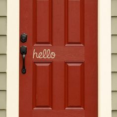 a red door with welcome sign on it's side and the words, lacybella designs