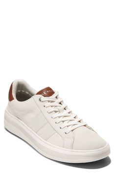 This sporty and stylish sneaker is a comfortable footwear staple you'll want to wear with every outfit. Cushioned insole White sole Leather upper/textile and leather lining/rubber sole Imported Mens Dinner Outfit Casual, Mens Dinner Outfit, White Tennis Shoes, Comfortable Footwear, Sneakers Outfit, Ivory White, Stylish Sneakers, Mens Casual Shoes, Mens Shoes Sneakers