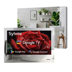 the google tv is on display in front of a white room with plants and pictures