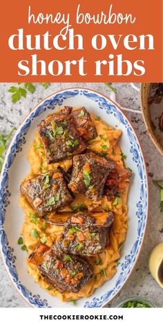 a plate full of short ribs with sauce and parsley on the side