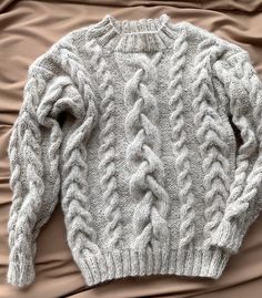 "Beige cable knit women pullover wiht round neck. Product Details: * 100% hand knit * 75% alpaca, 25% merino wool. Regular fit. Size: S(4-6) M(8-10) L(12-14) S Width : 46/48 cm Length: 58/60 cm M Width : 50/52 cm Length: 60 cm L Width : 54 cm Length: 62 cm Please let me know your size. It is made for order. If you would like me in other size, you could request a custom order with your own parameters: your height, bust and length of the sweater from the shoulder in cm. Or add your comments about Winter Crew Neck Cable Knit Pattern, Winter Cable Knit Crew Neck Knitting Pattern, Alpaca Crew Neck Sweater With Chunky Knit, Alpaca Chunky Knit Crew Neck Sweater, Alpaca Crew Neck Sweater In Chunky Knit, Cozy Alpaca Cable Knit Sweater, Hand Knitted Alpaca Crew Neck Sweater, Hand Knitted Alpaca Sweater Crew Neck, Beige Pullover