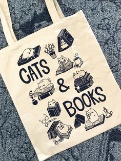 Tote Bag Book Design, Cat Tote Bag Design, Sublimation Tote Bag Ideas, Cute Tote Bag Design, Books Tote Bag, Cat Bags, Cat Merch, Cats Books, Purring Cat