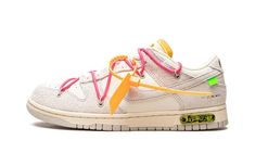 The Off-White x Nike Dunk Low “Lot 17” is one of multiple colorways of the classic low-top shoe created by Virgil Abloh in collaboration with Nike in August 2021.  A monumental collection that spans 50 unique colorways of the retro basketball shoe, the Off-White and Nike “Lot 50” line succeeds Abloh’s influential “The 10” collaboration with Nike from 2017.  On “Lot 17,” Sail canvas appears on the toe, mid-panel and collar.  The overlays and Swoosh are constructed in Neutral Grey leather.  Black “Nike” branding is printed on the heel and Off-White’s signature Helvetica text is found on the medial side.  A secondary, bungee cord-like lacing system is added to the upper in addition to a traditional lacing setup.  The look is carried over from Off-White’s first Nike Dunk collaboration from 201 Dunk Low Off White, Nike Dunk Low Off White, Off White Dunk, Nike Noir, Nike X Travis Scott, Ugg Ultra Mini, Off White X Nike, Retro Basketball Shoes, Mode Zara