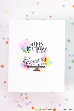 a birthday card with the words happy birthday written in black ink on top of it