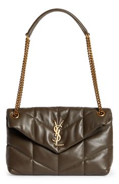 Inspired by and named for Yves Saint Laurent's muse Loulou de la Falaise, this puffer-style bag is crafted with matelassé stitching and monogram hardware. A pull-through chain strap can be doubled or extended as you prefer. Magnetic-snap flap closure Pull-through chain-and-leather strap Interior zip pocket Lined Leather Made in Italy Designer Handbags Sac Yves Saint Laurent, Puffer Bag, Saint Laurent Fashion, Leather Puffer, Dream Bags, Yves Saint Laurent Bags, Chunky Jewelry, The Saint, Bag Light