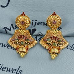 These stunning 22k gold earrings are a testament to exquisite craftsmanship and traditional Indian design. Weighing 11.1 grams, these earrings feature an intricate pattern and are perfect for bridal wear or adding elegance to any special occasion. Measuring 5 cm in length and 2.8 cm in width, their dangling style adds a touch of grace and charm. Material: 22k pure gold Weight: 11.1 grams Dimensions: 5 cm long, 2.8 cm wide Design: Handcrafted with intricate traditional details Occasion: Ideal for weddings, engagements, or ethnic celebrations These timeless earrings are a beautiful blend of cultural heritage and elegance, making them the perfect accessory for any special event. the earrings come with normal backs but if you want real gold screw please contact. 18k gold weight is less Click h 22k Gold Earrings, Indian Bridal Jewelry, Gold Earrings For Women, Bridal Jewellery Indian, Traditional Indian, Pure Gold, Indian Design, 22k Gold, Indian Bridal