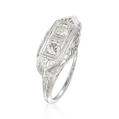 Ross-Simons - C. 1950 Vintage .25ct t. w. Diamond Filigree Ring in 18kt White Gold. Size 7. C. 1950. This beautiful Retro-era filigree ring from our Estate collection is a truly unique find. Two round Old European-cut diamonds, totaling .25 carats, sparkle from their 18kt white gold perch. Made before the invention of modern filigree techniques, this delicate pattern adds a layer of dimension to the ring. 3/8? wide. Diamond filigree ring. Exclusive, one-of-a-kind Estate Jewelry. Diamond birthsto Timeless Hallmarked Platinum Diamond Ring, Timeless Platinum Hallmarked Diamond Ring, Formal White Gold Signet Ring With 17 Jewels, Elegant Platinum Wedding Signet Ring, Elegant Platinum Signet Ring For Wedding, Formal Fine Jewelry Diamond Ring With Filigree, 14k White Gold Signet Ring For Wedding, Fine Jewelry, Classic Filigree Ring With 17 Jewels For Wedding, Classic Formal Engraved Ring With 17 Jewels