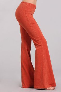 Experience luxury with our Chatoyant Mineral Wash Bell Bottoms! These pants have the appearance of mineral jeans, but the comfort of leggings and an elastic waist. Each one is uniquely hand-dyed, resulting in beautiful variations that add character. With an inseam of 33 inches and made in America with a blend of 93% cotton and 7% spandex, these pants are the epitome of premium quality. Perfect for resort wear, exude elegance and sophistication while staying comfortable and sexy. Check out all th Fall Soft-washed Wide Leg Bottoms, Spring Acid Wash Stretch Pants, Soft-washed Wide Leg Bottoms For Fall, Stretch Acid Wash Pants For Spring, Soft-washed Wide Leg Pants For Spring, Trendy Full Length Fall Pants, Trendy Full Length Pants For Fall, Trendy Flare Yoga Pants For Spring, Trendy Flared Yoga Pants For Spring