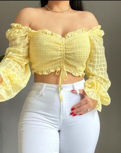 Elevate your style with this cute and sexy yellow blouse from PRIVY. The long-sleeved crop top is made from comfortable polyester and features a regular fit. Perfect for a night out, a date, or a casual brunch with friends. #PRIVY #WomensFashion #SexyBlouse #YellowTop #Fashionista 😍👚💛 Yellow Crop Top Outfit, Long Sleeve Cropped Top Outfits, Lantern Sleeve Top, Yellow Crop Top, Yellow Outfit, Cute Blouses, Crop Top Outfits, Blouse Material, Crop Top Blouse