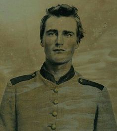 an old photo of a man in uniform