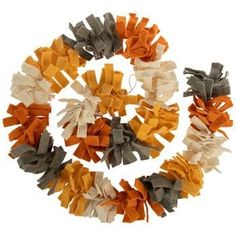 an assortment of orange, grey and white hair bows on a white background with clippings