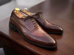 Discover timeless sophistication with our Oxford Brown Leather Wingtip Brogue Shoes for Men. Expertly handcrafted from premium brown leather, these dress shoes feature a classic wingtip design with intricate brogue detailing, offering a refined look that stands out in any formal or business setting. The distinctive wingtip and brogue detailing make them the perfect choice for any formal occasion or professional setting. These luxurious fashion shoes are designed to elevate your wardrobe with their timeless style and exceptional craftsmanship. Perfect for formal events, weddings, or adding a touch of refinement to your everyday attire, these brogues offer both style and comfort. 100% Original Handmade Premium Quality Leather Shoes & Boots Top Niche Features: - Detailed Stitching and Craftsm Man Dressing Style, Luxurious Fashion, Brown Oxfords, Leather Boot Shoes, Brogue Shoes, Mens Oxfords, Shoes For Men, Formal Occasion, Leather Heels