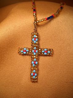 BEADED CROSS, on 23 inch necklace Multicolor Beaded Cross Jewelry, Cross Shaped Beaded Chain For Jewelry Making, Cross-shaped Beaded Chain For Jewelry Making, Spiritual Wire Wrapped Cross Pendant Necklace, Beaded Cross Pendant For Jewelry Making, Spiritual Beaded Cross Pendant Necklace, Blue Bohemian Necklace With Cross Pendant, Bohemian Blue Cross Pendant Necklace, Bohemian Beaded Cross Pendant Jewelry