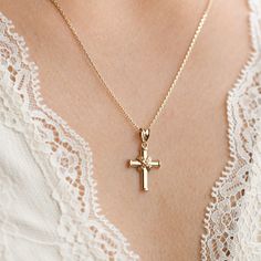 14k Gold Cross Pendant, Religious Jewelry, Christening, Dainty Cross Necklace, 14k Yellow Gold Crucifix Pendant, 16mm Small Size *Free Express International Shipping *14K solid gold chain is included if you choose. NEXT BUSINESS DAY SHIPPING! PRODUCT DETAILS *The product is made of 100% 14k Solid Gold and it has a 14K or 585 stamp on item. (We don't sell filled or plated jewelry) *The package includes a gold certificate.  *The product includes 14K solid gold chain. *Every package comes in a gift box. *14K gold indicates that the product is produced from 58% pure gold. *Chain thickness: 1.00mm *Pendant measures: 16.00mmx12.50mm (small size) *The product is yellow gold. *       Made in Türkiye. ORDER PROCESS *We have some options for the chain length.  ABOUT SHIPPING We ship all packages saf 14k Yellow Gold Crucifix Jewelry, 14k Gold Crucifix Jewelry, 14k Gold Hallmarked Crucifix Jewelry, 14k Gold Crucifix Hallmarked Jewelry, 14k Gold Stamped Crucifix Jewelry For Anniversary, 14k Gold Crucifix Jewelry As Gift, 14k Stamped Crucifix Jewelry For Anniversary, Fine Jewelry Cross Pendant For Wedding, 14k Gold Crucifix Jewelry For Anniversary