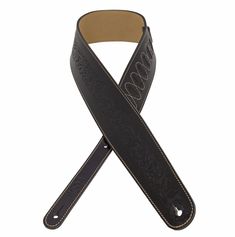 a black leather guitar strap with white stitching on the side and an embellishment