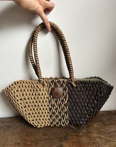 Vintage Woven Straw Tote | Natural Straw Shoulder Bag | Black & Tan Straw Purse Awesome vintage find! This gorgeous boho purse is everything for the summer season. Take it to the beach or a festival. In good condition. Some minor staining on inner lining from age and general use (pictured). Measurements: 20w5d9h Bohemian Satchel Beach Bag, Bohemian Brown Straw Bag With Handles, Bohemian Brown Bags With Braided Handles, Bohemian Brown Bag With Braided Handles, Bohemian Straw Bag With Handles, Bohemian Brown Beach Bag With Double Handle, Brown Bohemian Straw Bag For Everyday Use, Bohemian Brown Straw Satchel Bag, Bohemian Brown Satchel Straw Bag