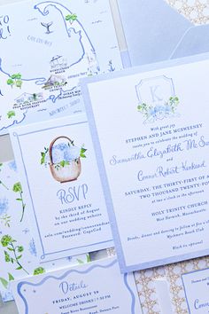 the wedding stationery is laid out on top of each other, including an envelope